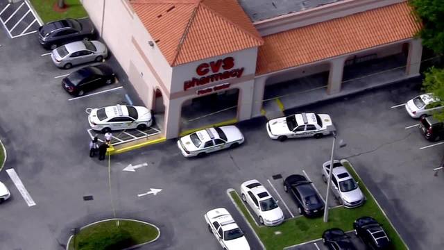 man shoots gun into ceiling during robbery at miami cvs